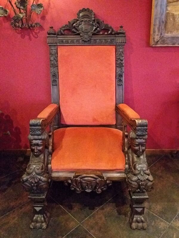 DC 22-0808-081.jpg :: Saga Douro River Cruise, Favaios, Avessada Wine Estate: Quinta da Avessada is located in the centre of the Douro demarcated region at its highest point (at an altitude of 600 meters) and the flattest point in the whole region (about 1,000ha of plateau), consisting of four buildings (one of them is one hundred years old) and 25ha of planting. Due to this, 90% of its plantation is destined to the production of Muscat grapes, with which Moscatel de Favaios is produced, and is designated a national apéritif. It is the Wine-Growing Village of Favaios. Antique Chair. Photo taken 02/09/2022