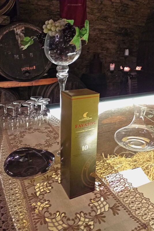 DC 22-0808-084.jpg :: Saga Douro River Cruise, Favaios, Avessada Wine Estate: Quinta da Avessada is located in the centre of the Douro demarcated region at its highest point (at an altitude of 600 meters) and the flattest point in the whole region (about 1,000ha of plateau), consisting of four buildings (one of them is one hundred years old) and 25ha of planting. Due to this, 90% of its plantation is destined to the production of Muscat grapes, with which Moscatel de Favaios is produced, and is designated a national apéritif. It is the Wine-Growing Village of Favaios. Adega de Favaios wine. Photo taken 02/09/2022