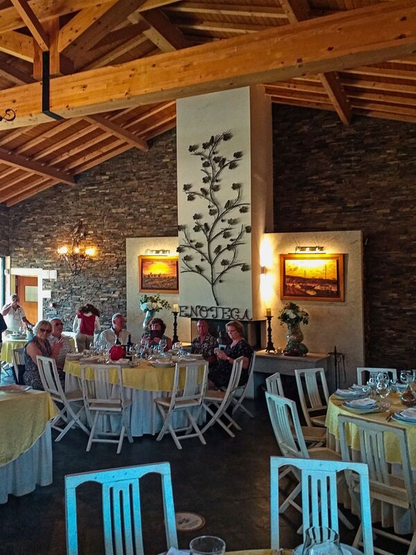 DC 22-0808-085.jpg :: Saga Douro River Cruise, Favaios, Avessada Wine Estate: Quinta da Avessada is located in the centre of the Douro demarcated region at its highest point (at an altitude of 600 meters) and the flattest point in the whole region (about 1,000ha of plateau), consisting of four buildings (one of them is one hundred years old) and 25ha of planting. Due to this, 90% of its plantation is destined to the production of Muscat grapes, with which Moscatel de Favaios is produced, and is designated a national apéritif. It is the Wine-Growing Village of Favaios. Dining area. Photo taken 02/09/2022