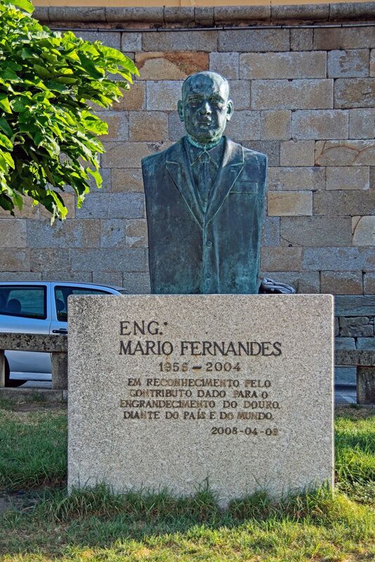 DC 22-0809-002.jpg :: Saga Douro River Cruise, Pinhao to Regua, Portugal: This monument honours Engenheiro Mário Fernandes (1955–2004), a pioneering figure in Portugal's navigation history. Mário Fernandes, who served as the first director of the Instituto de Navegabilidade do Douro. The bust is located in Peso da Régua, a city in northern Portugal within the Douro wine region. It was erected in 2008 in recognition of his significant contributions to the development and enhancement of the Douro River, both nationally and internationally. Photo taken 03/09/2022