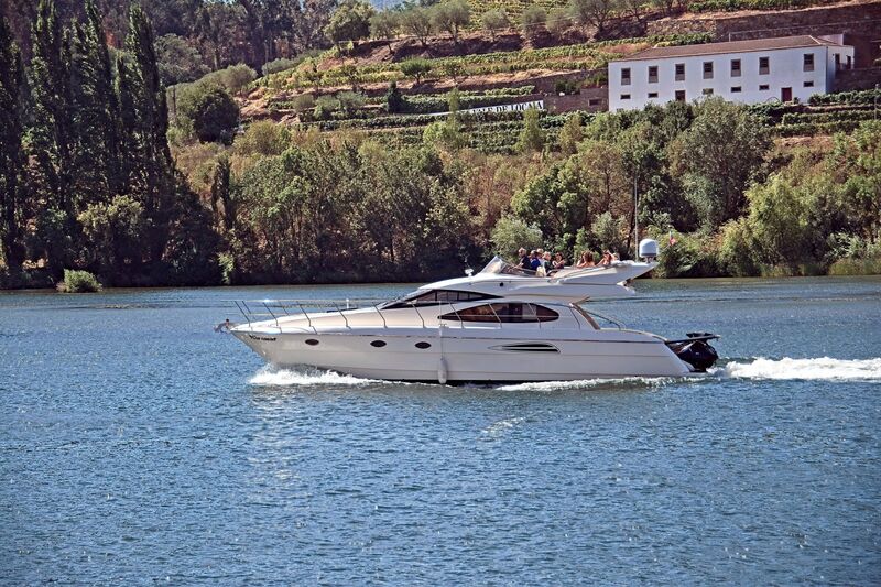 DC 22-0809-012.jpg :: Saga Douro River Cruise, Pinhao to Regua, Portugal: An Azimut 46 Flybridge luxury motor yacht cruising on the Douro River in the region of Peso da Régua, Portugal. Photo taken 03/09/2022