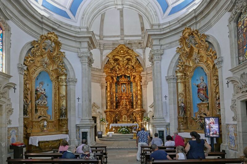 DC 22-0810-009.jpg :: Saga Douro River Cruise, Santuario de Nossa Senhora dos Remedios and Regua:  Ornate interior of the Santuário de Nossa Senhora dos Remédios (Sanctuary of Our Lady of Remedies) in Lamego, Portugal. The sanctuary is a significant pilgrimage site and considered an important part of Portuguese heritage. The interior features a richly carved, gilded altar, which is considered a work of art. The overall architectural style is Baroque. Photo taken 03/09/2022