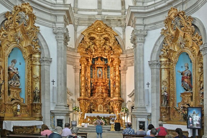 DC 22-0810-012.jpg :: Saga Douro River Cruise, Santuario de Nossa Senhora dos Remedios and Regua:  Ornate interior of the Santuário de Nossa Senhora dos Remédios (Sanctuary of Our Lady of Remedies) in Lamego, Portugal. The sanctuary is a significant pilgrimage site and considered an important part of Portuguese heritage. The interior features a richly carved, gilded altar, which is considered a work of art. The overall architectural style is Baroque. Photo taken 03/09/2022