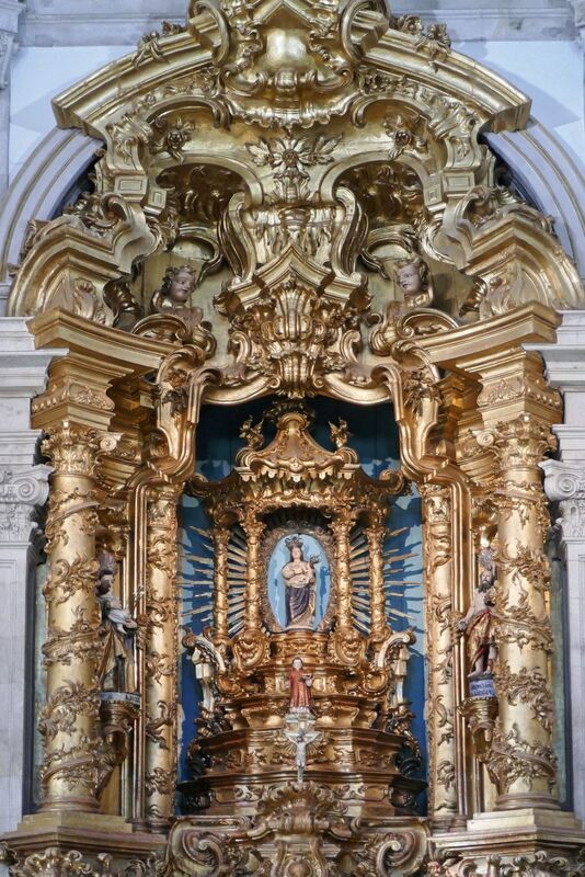 DC 22-0810-014.jpg :: Saga Douro River Cruise, Santuario de Nossa Senhora dos Remedios and Regua:  Ornate interior of the Santuário de Nossa Senhora dos Remédios (Sanctuary of Our Lady of Remedies) in Lamego, Portugal. The sanctuary is a significant pilgrimage site and considered an important part of Portuguese heritage. The interior features a richly carved, gilded altar, which is considered a work of art. The overall architectural style is Baroque. Photo taken 03/09/2022