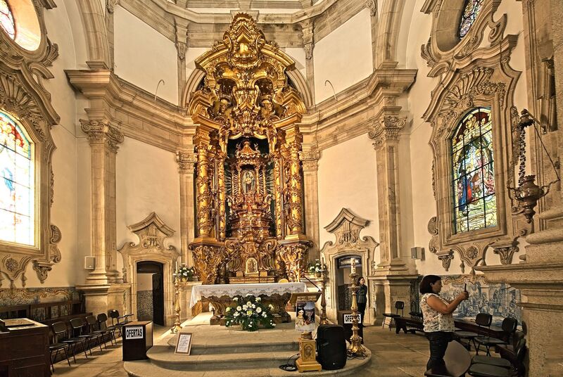 DC 22-0810-016.jpg :: Saga Douro River Cruise, Santuario de Nossa Senhora dos Remedios and Regua:  Ornate interior of the Santuário de Nossa Senhora dos Remédios (Sanctuary of Our Lady of Remedies) in Lamego, Portugal. The sanctuary is a significant pilgrimage site and considered an important part of Portuguese heritage. The interior features a richly carved, gilded altar, which is considered a work of art. The overall architectural style is Baroque. Photo taken 03/09/2022