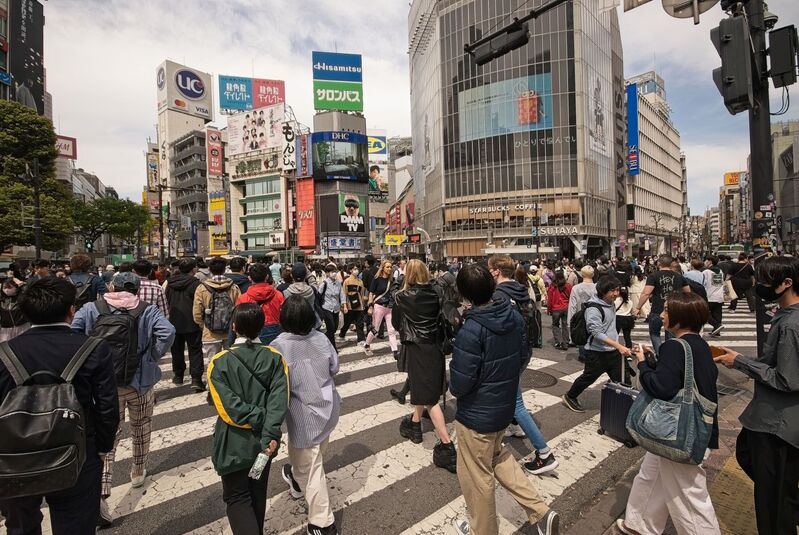 DC 23-0677-050.jpg :: Iglu Tour, Ultimate Japan & Cherry Blossom: Tokyo, Japan. The most famous pedestrian crossing in Tokyo is the Shibuya Crossing, also known as the Shibuya Scramble Crossing. It's the world's busiest pedestrian crossing, with thousands of people crossing simultaneously when the lights turn red for cars. This iconic landmark is located in front of Shibuya Station's Hachiko exit and is a must-see for any visitor to Tokyo. Photo taken 31/03/2023