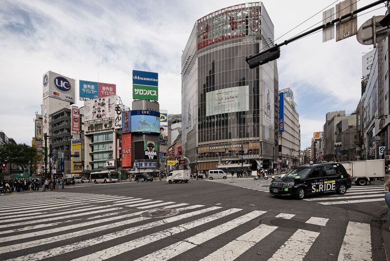 DC 23-0677-052.jpg :: Iglu Tour, Ultimate Japan & Cherry Blossom: Tokyo, Japan. The most famous pedestrian crossing in Tokyo is the Shibuya Crossing, also known as the Shibuya Scramble Crossing. It's the world's busiest pedestrian crossing, with thousands of people crossing simultaneously when the lights turn red for cars. This iconic landmark is located in front of Shibuya Station's Hachiko exit and is a must-see for any visitor to Tokyo. Photo taken 31/03/2023