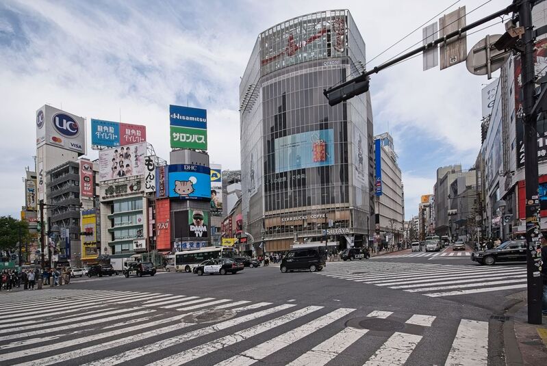 DC 23-0677-053.jpg :: Iglu Tour, Ultimate Japan & Cherry Blossom: Tokyo, Japan. The most famous pedestrian crossing in Tokyo is the Shibuya Crossing, also known as the Shibuya Scramble Crossing. It's the world's busiest pedestrian crossing, with thousands of people crossing simultaneously when the lights turn red for cars. This iconic landmark is located in front of Shibuya Station's Hachiko exit and is a must-see for any visitor to Tokyo. Photo taken 31/03/2023