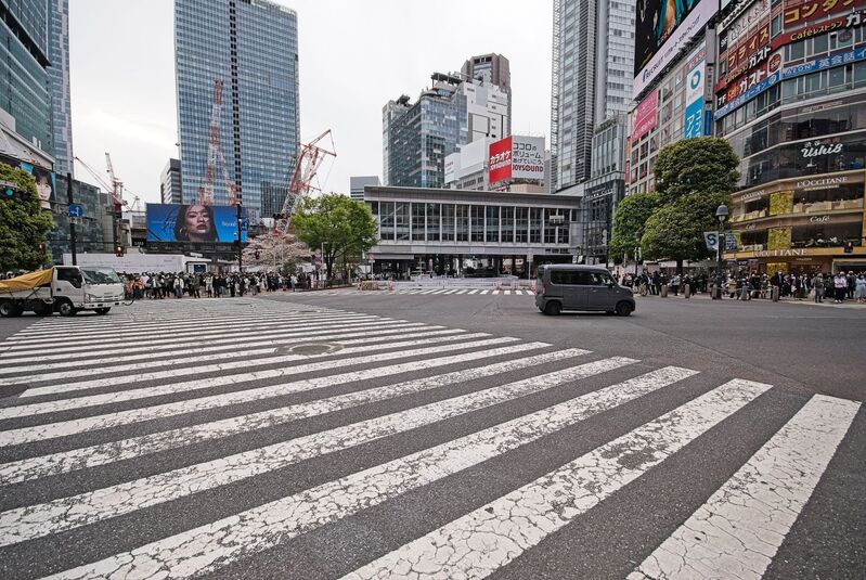 DC 23-0677-058.jpg :: Iglu Tour, Ultimate Japan & Cherry Blossom: Tokyo, Japan. The most famous pedestrian crossing in Tokyo is the Shibuya Crossing, also known as the Shibuya Scramble Crossing. It's the world's busiest pedestrian crossing, with thousands of people crossing simultaneously when the lights turn red for cars. This iconic landmark is located in front of Shibuya Station's Hachiko exit and is a must-see for any visitor to Tokyo. Photo taken 31/03/2023