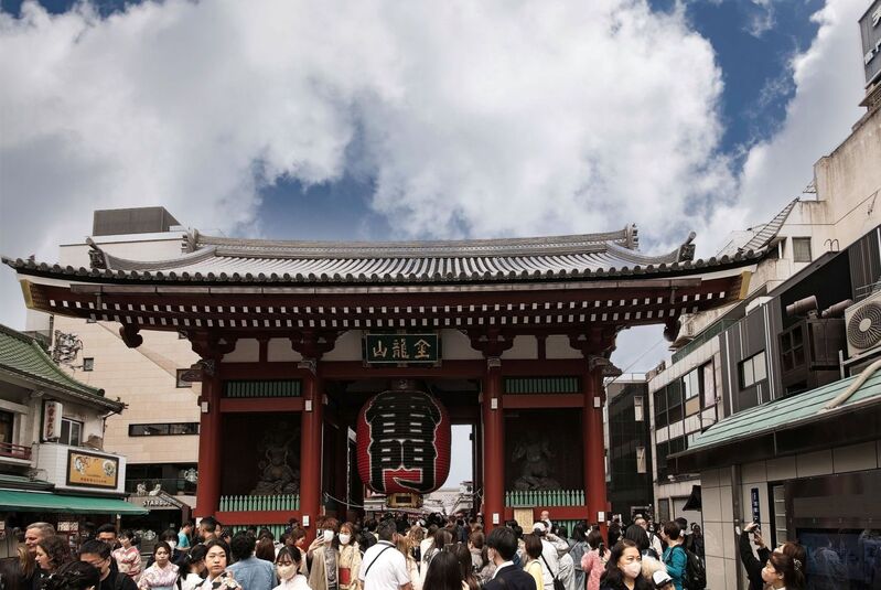 DC 23-0677-071.jpg :: Iglu Tour, Ultimate Japan & Cherry Blossom: Tokyo, Japan. Senso-ji, widely known as Asakusa Kannon Temple, is Tokyo’s oldest Buddhist temple. Located in Asakusa, one of Tokyo’s most lively and busy districts, Senso-ji is one of the most visited spiritual sites in the world. This bright and colourful temple attracts so many people from all over the world that at times it’s even hard to walk around the temple grounds. Senso-ji was founded almost one and half millennia ago, in 645. The legend says that in 628 two fishermen caught a statue of Kannon, the goddess of compassion, in the nearby Sumida River. They tried to get rid of it, but it kept coming back to them. Taking it as a sign, the head of the fishermen’s village erected Senso-ji in honour of Kannon. The temple holds the original Kannon statue; however it can never be seen by the public and is supposedly stored safely inside 3 boxes. P.s. Kaminarimon Gate – first gate. The first of two gates leading to Senso-ji is Kaminarimon Gate, also known as “Thunder Gate”. The gate was first constructed in 941, and was originally located south of its current location in the Komagata area. In 1635 the gate was reconstructed closer to the temple where it can be seen today. The gate seen today is not the original one though – it has suffered under many fires over the years. The original gate burned a few years after its installation and was only rebuilt by a Tokugawa Shogun in 1649. In the 1700’s and 1800’s the gate burned to the ground a few times. The gate you see today was built in 1960. Photo taken 31/03/2023