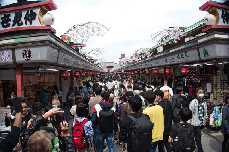 DC 23-0677-078.jpg :: Iglu Tour, Ultimate Japan & Cherry Blossom: Tokyo, Japan. Senso-ji, widely known as Asakusa Kannon Temple, is Tokyo’s oldest Buddhist temple. Located in Asakusa, one of Tokyo’s most lively and busy districts, Senso-ji is one of the most visited spiritual sites in the world. This bright and colourful temple attracts so many people from all over the world that at times it’s even hard to walk around the temple grounds. Senso-ji was founded almost one and half millennia ago, in 645. The legend says that in 628 two fishermen caught a statue of Kannon, the goddess of compassion, in the nearby Sumida River. They tried to get rid of it, but it kept coming back to them. Taking it as a sign, the head of the fishermen’s village erected Senso-ji in honour of Kannon. The temple holds the original Kannon statue, however it can never be seen by the public and is supposedly stored safely inside 3 boxes. P.s. Nakamise Dori, senso-ji. Nakamise Dori is a street full of stalls and small shops. The street stretches from the Kaminarimon Gate to the Hozomon Gate. Shops sell everything from souvenirs to snacks, toys and clothes. The street of Nakamise dates way back. Under the Tokugawa clans ruling locals who served visitors to the Senso-ji temple were given permissions to put up stalls on the street leading up to the temple. This is considered the beginning of Nakamise Dori as a shopping street. During the Meiji Restoration, when Senso-ji was converted to a park, the stall owners were kicked out by the government and western style buildings were constructed in 1885. These buildings were destroyed in a large earthquake in 1923. The shopping street was rebuilt in what was supposedly a magnificent and beautiful vermilion-lacquered style but was completely destroyed again during world war 2. Photo taken 31/03/2023