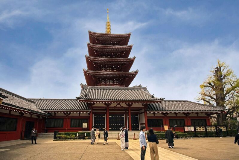 DC 23-0677-090.jpg :: Iglu Tour, Ultimate Japan & Cherry Blossom: Tokyo, Japan. Senso-ji, widely known as Asakusa Kannon Temple, is Tokyo’s oldest Buddhist temple. Located in Asakusa, one of Tokyo’s most lively and busy districts, Senso-ji is one of the most visited spiritual sites in the world. This bright and colourful temple attracts so many people from all over the world that at times it’s even hard to walk around the temple grounds. Senso-ji was founded almost one and half millennia ago, in 645. The legend says that in 628 two fishermen caught a statue of Kannon, the goddess of compassion, in the nearby Sumida River. They tried to get rid of it, but it kept coming back to them. Taking it as a sign, the head of the fishermen’s village erected Senso-ji in honour of Kannon. The temple holds the original Kannon statue; however, it can never be seen by the public and is supposedly stored safely inside 3 boxes. P.s. This five-stored pagoda inside the grounds of a popular tourist spot, Senso-ji Temple is a typical tower found in many Buddhist temples in Japan. Inside the pagoda, the remains of Buddha, the founder of Buddhism is placed. The original pagoda was constructed in 942. However, it has been successively lost by fire and subsequently reconstructed. The current pagoda was rebuilt in 1973 over the reinforced concrete base building and is 53.32 meters high. It becomes a popular sightseeing spot also for foreign visitors and draws attention. Photo taken 31/03/2023