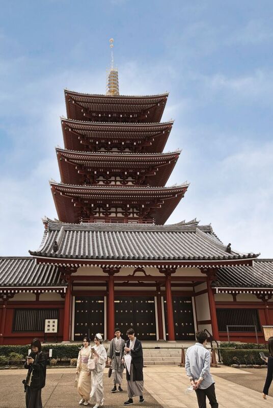 DC 23-0677-091.jpg :: Iglu Tour, Ultimate Japan & Cherry Blossom: Tokyo, Japan. Senso-ji, widely known as Asakusa Kannon Temple, is Tokyo’s oldest Buddhist temple. Located in Asakusa, one of Tokyo’s most lively and busy districts, Senso-ji is one of the most visited spiritual sites in the world. This bright and colourful temple attracts so many people from all over the world that at times it’s even hard to walk around the temple grounds. Senso-ji was founded almost one and half millennia ago, in 645. The legend says that in 628 two fishermen caught a statue of Kannon, the goddess of compassion, in the nearby Sumida River. They tried to get rid of it, but it kept coming back to them. Taking it as a sign, the head of the fishermen’s village erected Senso-ji in honour of Kannon. The temple holds the original Kannon statue; however, it can never be seen by the public and is supposedly stored safely inside 3 boxes. P.s. This five-stored pagoda inside the grounds of a popular tourist spot, Senso-ji Temple is a typical tower found in many Buddhist temples in Japan. Inside the pagoda, the remains of Buddha, the founder of Buddhism is placed. The original pagoda was constructed in 942. However, it has been successively lost by fire and subsequently reconstructed. The current pagoda was rebuilt in 1973 over the reinforced concrete base building and is 53.32 meters high. It becomes a popular sightseeing spot also for foreign visitors and draws attention. Photo taken 31/03/2023