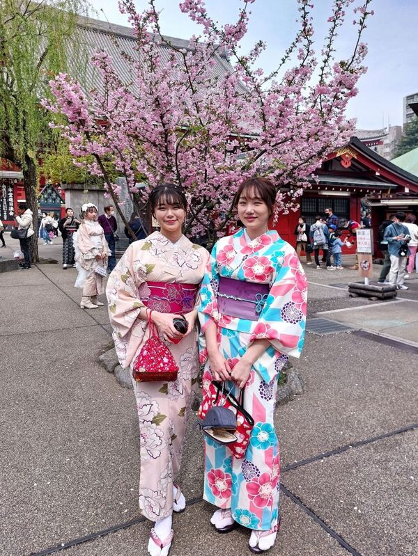 DC 23-0677-098.jpg :: Iglu Tour, Ultimate Japan & Cherry Blossom: Tokyo, Japan. Senso-ji, widely known as Asakusa Kannon Temple, is Tokyo’s oldest Buddhist temple. Located in Asakusa, one of Tokyo’s most lively and busy districts, Senso-ji is one of the most visited spiritual sites in the world. This bright and colourful temple attracts so many people from all over the world that at times it’s even hard to walk around the temple grounds. Senso-ji was founded almost one and half millennia ago, in 645. The legend says that in 628 two fishermen caught a statue of Kannon, the goddess of compassion, in the nearby Sumida River. They tried to get rid of it, but it kept coming back to them. Taking it as a sign, the head of the fishermen’s village erected Senso-ji in honour of Kannon. The temple holds the original Kannon statue; however, it can never be seen by the public and is supposedly stored safely inside 3 boxes. P.s. Japanese woman that is dressed up in a kimono. During spring, thousands of young women rent kimonos and have their pictures taken in front of temples and blossoming trees. Photo taken 31/03/2023