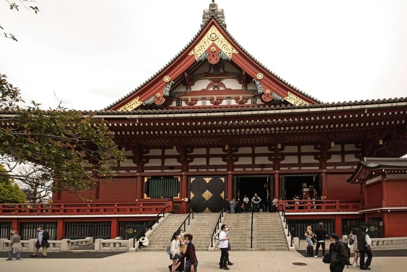 DC 23-0677-110.jpg :: Iglu Tour, Ultimate Japan & Cherry Blossom: Tokyo, Japan. Senso-ji, widely known as Asakusa Kannon Temple, is Tokyo’s oldest Buddhist temple. Located in Asakusa, one of Tokyo’s most lively and busy districts, Senso-ji is one of the most visited spiritual sites in the world. This bright and colourful temple attracts so many people from all over the world that at times it’s even hard to walk around the temple grounds. Senso-ji was founded almost one and half millennia ago, in 645. The legend says that in 628 two fishermen caught a statue of Kannon, the goddess of compassion, in the nearby Sumida River. They tried to get rid of it, but it kept coming back to them. Taking it as a sign, the head of the fishermen’s village erected Senso-ji in honour of Kannon. The temple holds the original Kannon statue; however, it can never be seen by the public and is supposedly stored safely inside 3 boxes. Photo taken 31/03/2023