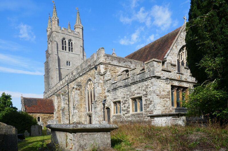 DC 24-0736-002.jpg :: Tenterden, Kent: St. Mildred's Church is an Anglican church located in Tenterden in the borough of Ashford in Kent. The church dates from about the 12th century and is Grade I heritage listed. The main tower of the church is 39.6 metres (130 feet) high and was constructed in 1461. It is dedicated to a prominent Anglo-Saxon saint, Saint Mildred, a 7th-century princess who served as the abbess of the nunnery at Minister-in-Thanet. The main tower of the church is built from Bethersden Marble, a limestone that contains thousands of brightly coloured shells. A graveyard is also present on the left-hand side of the church. Photo taken 04/09/2024