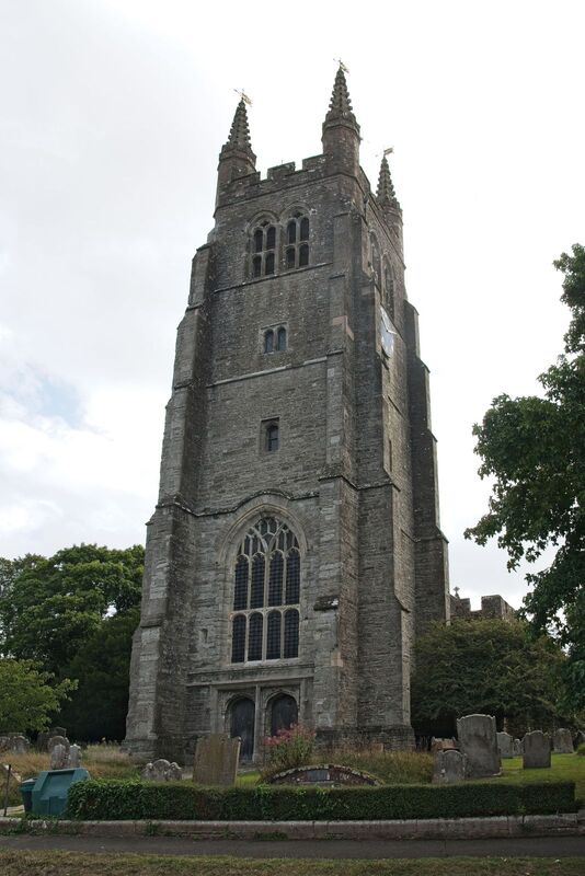 DC 24-0736-013.jpg :: Tenterden, Kent: St. Mildred's Church is an Anglican church located in Tenterden in the borough of Ashford in Kent. The church dates from about the 12th century and is Grade I heritage listed. The main tower of the church is 39.6 metres (130 feet) high and was constructed in 1461. It is dedicated to a prominent Anglo-Saxon saint, Saint Mildred, a 7th-century princess who served as the abbess of the nunnery at Minister-in-Thanet. The main tower of the church is built from Bethersden Marble, a limestone that contains thousands of brightly coloured shells. A graveyard is also present on the left-hand side of the church. Photo taken 04/09/2024