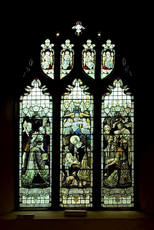 DC 24-0736-022.jpg :: Tenterden, Kent: St. Mildred's Church is an Anglican church located in Tenterden in the borough of Ashford in Kent. The church dates from about the 12th century and is Grade I heritage listed. The main tower of the church is 39.6 metres (130 feet) high and was constructed in 1461. It is dedicated to a prominent Anglo-Saxon saint, Saint Mildred, a 7th-century princess who served as the abbess of the nunnery at Minister-in-Thanet. The main tower of the church is built from Bethersden Marble, a limestone that contains thousands of brightly coloured shells. A graveyard is also present on the left-hand side of the church. Stained glass windows, Queen Victoria Jubilee Memorial Window. In memory of Henry Goodsall upwards of fifty-three years Parish Clerk who died 6th March 1895. 'The Nativity, by TF Curtis & Ward & Hughes, 1897. Photo taken 04/09/2024