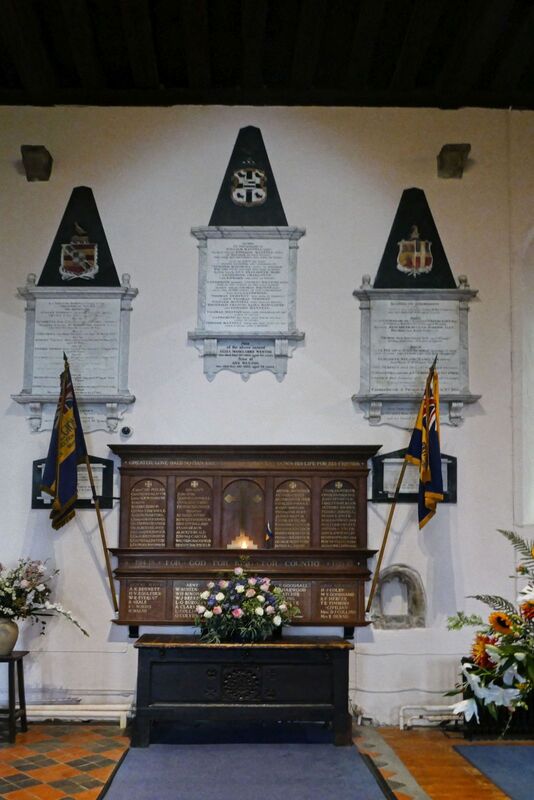 DC 24-0736-036.jpg :: Tenterden, Kent: St. Mildred's Church is an Anglican church located in Tenterden in the borough of Ashford in Kent. The church dates from about the 12th century and is Grade I heritage listed. The main tower of the church is 39.6 metres (130 feet) high and was constructed in 1461. It is dedicated to a prominent Anglo-Saxon saint, Saint Mildred, a 7th-century princess who served as the abbess of the nunnery at Minister-in-Thanet. The main tower of the church is built from Bethersden Marble, a limestone that contains thousands of brightly coloured shells. A graveyard is also present on the left-hand side of the church. Photo taken 04/09/2024