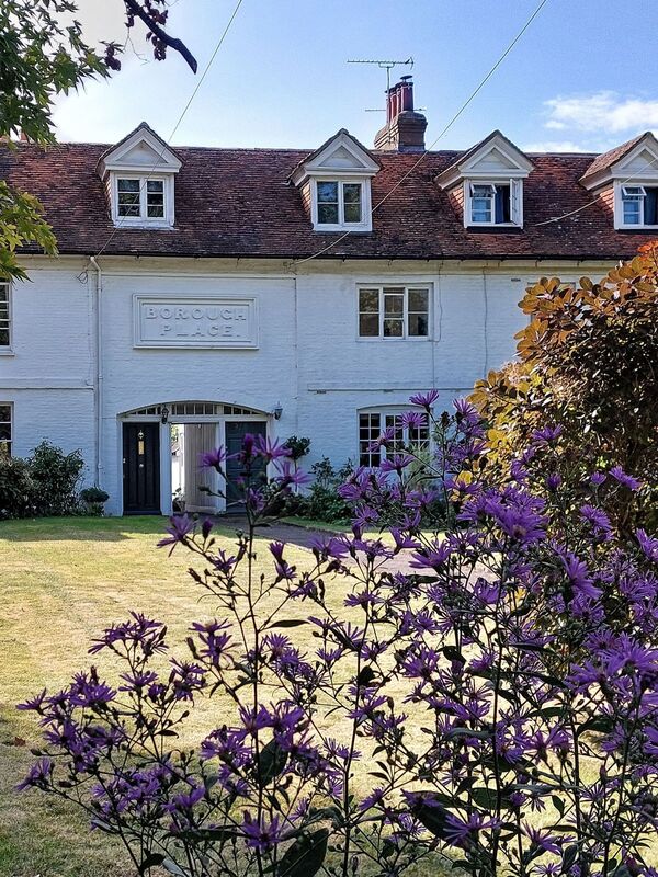 DC 24-0736-049.jpg :: Tenterden, Kent: Borough Place, a row of late C13 to early C19 cottages. 2 storeys and attics colour washed brick. Grade II listed building. Located High Street, Tenterden. Photo taken 04/09/2024