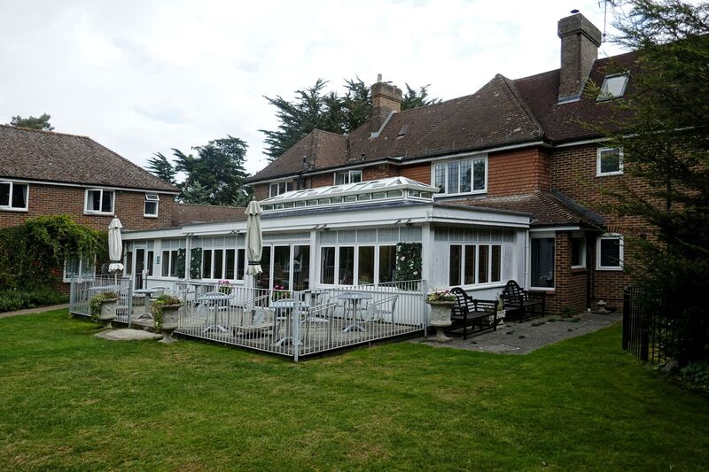 DC 24-0736-072.jpg :: Tenterden, Kent: Little Silver Country Hotel, a former 16 bedroom hotel and wedding venue on Ashford Road in Tenterden. The main part of the property features a mock-Tudor façade and dates back to the mid 20th century. and terrace at rear of the hotel. Photo taken 04/09/2024