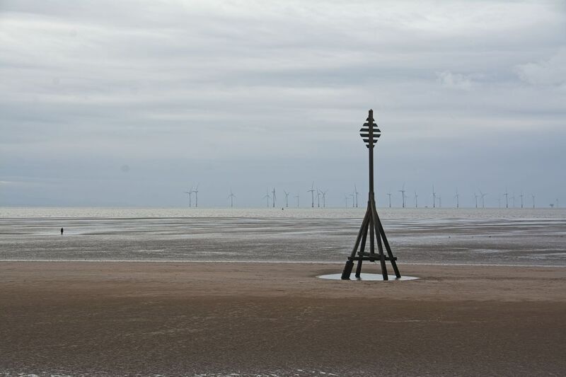 DC 24-0746-003.jpg :: Crosby Beach, Merseyside: Crosby Beach is part of the Merseyside coastline north of Liverpool in the Metropolitan Borough of Sefton, England, stretching about 2.5 miles (4.0 km) North-West from the Seaforth Dock in the Port of Liverpool, through Waterloo, where it separates the sea from the Marina. The beach was awarded Keep Britain Tidy's Quality Coast Award in 2011. Since 2007, the beach has been the permanent home of the Another Place sculptures by Antony Gormley. Photo taken 27/10/2024