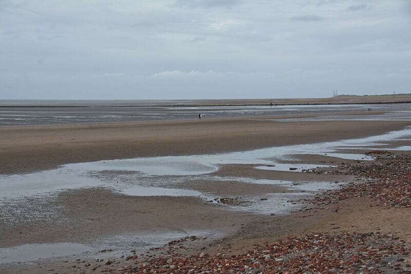 DC 24-0746-005.jpg :: Crosby Beach, Merseyside: Crosby Beach is part of the Merseyside coastline north of Liverpool in the Metropolitan Borough of Sefton, England, stretching about 2.5 miles (4.0 km) North-West from the Seaforth Dock in the Port of Liverpool, through Waterloo, where it separates the sea from the Marina. The beach was awarded Keep Britain Tidy's Quality Coast Award in 2011. Since 2007, the beach has been the permanent home of the Another Place sculptures by Antony Gormley. Photo taken 27/10/2024
