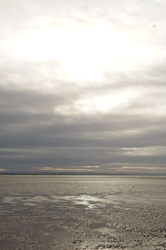 DC 24-0746-014.jpg :: Crosby Beach, Merseyside: Crosby Beach is part of the Merseyside coastline north of Liverpool in the Metropolitan Borough of Sefton, England, stretching about 2.5 miles (4.0 km) North-West from the Seaforth Dock in the Port of Liverpool, through Waterloo, where it separates the sea from the Marina. The beach was awarded Keep Britain Tidy's Quality Coast Award in 2011. Since 2007, the beach has been the permanent home of the Another Place sculptures by Antony Gormley. Photo taken 27/10/2024