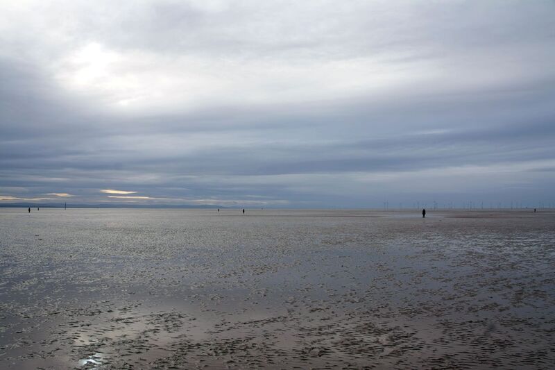 DC 24-0746-015.jpg :: Crosby Beach, Merseyside: Crosby Beach is part of the Merseyside coastline north of Liverpool in the Metropolitan Borough of Sefton, England, stretching about 2.5 miles (4.0 km) North-West from the Seaforth Dock in the Port of Liverpool, through Waterloo, where it separates the sea from the Marina. The beach was awarded Keep Britain Tidy's Quality Coast Award in 2011. Since 2007, the beach has been the permanent home of the Another Place sculptures by Antony Gormley. Photo taken 27/10/2024