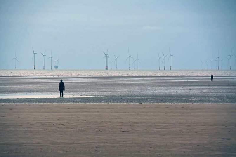 DC 24-0746-024.jpg :: Crosby Beech, Merseyside: Commonly referred to as ‘The Iron Men’ (or even the Crosby Beach statues), the art installation is officially called ‘Another Place’. Another Place was created by world-famous artist and sculptor Sir Antony Gormley, who famously created The Angel of the North. The Iron Men consist of 100 cast iron figures that have been installed along Crosby Beach facing the sea. The figures themselves are modelled from Antony Gormley’s body, and they were cast in the UK in both Halifax and West Bromwich. The Iron Men arrived in Liverpool in July 2005, but their story begins nearly 10 years earlier. In 1997, Another Place was first installed on Cuxhaven beach, in Lower Saxony, Germany. From there, they went to Stavanger in Norway and then to De Panne in Belgium. When The Iron Men found their new home at Crosby Beach in 2005, it was only supposed to be temporary. Photo taken 27/10/2024