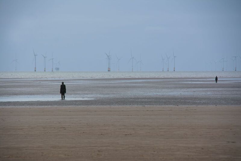DC 24-0746-025.jpg :: Crosby Beech, Merseyside: Commonly referred to as ‘The Iron Men’ (or even the Crosby Beach statues), the art installation is officially called ‘Another Place’. Another Place was created by world-famous artist and sculptor Sir Antony Gormley, who famously created The Angel of the North. The Iron Men consist of 100 cast iron figures that have been installed along Crosby Beach facing the sea. The figures themselves are modelled from Antony Gormley’s body, and they were cast in the UK in both Halifax and West Bromwich. The Iron Men arrived in Liverpool in July 2005, but their story begins nearly 10 years earlier. In 1997, Another Place was first installed on Cuxhaven beach, in Lower Saxony, Germany. From there, they went to Stavanger in Norway and then to De Panne in Belgium. When The Iron Men found their new home at Crosby Beach in 2005, it was only supposed to be temporary. Photo taken 27/10/2024