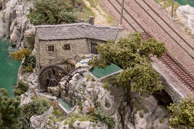 DC 25-0767-003.jpg :: Miniatur Wunderland Hamburg, Germany: The Miniatur Wunderland is, according to Guinness World Records, the largest model railway system in the world. It is located at the historic Speicherstadt in Hamburg and is one of the most popular and most visited sights in Germany. The exhibition includes around 1,230 digitally controlled trains with more than 12,000 wagons. The Wonderland is also designed with around 4,300 houses and bridges, more than 10,000 vehicles – of which around 350 drive independently on the installation – 47 airplanes and around 290,000 figures. The system features a recurring day-night lighting cycle and almost 500,000 built-in LED lights. Of the 7,000 m2 (75,347 sq ft) of floorspace, the models occupy 1,545 m2 (16,630 sq ft). P.s. Part of the Monaco section of the exhibition. Photo taken 20/01/2025