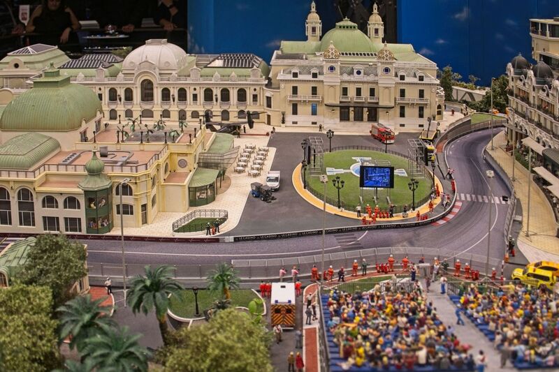 DC 25-0767-016.jpg :: Miniatur Wunderland Hamburg, Germany: The Miniatur Wunderland is, according to Guinness World Records, the largest model railway system in the world. It is located at the historic Speicherstadt in Hamburg and is one of the most popular and most visited sights in Germany. The exhibition includes around 1,230 digitally controlled trains with more than 12,000 wagons. The Wonderland is also designed with around 4,300 houses and bridges, more than 10,000 vehicles – of which around 350 drive independently on the installation – 47 airplanes and around 290,000 figures. The system features a recurring day-night lighting cycle and almost 500,000 built-in LED lights. Of the 7,000 m2 (75,347 sq ft) of floorspace, the models occupy 1,545 m2 (16,630 sq ft). P.s. Part of the Monaco section of the exhibition, Casino Square and race track. Photo taken 20/01/2025