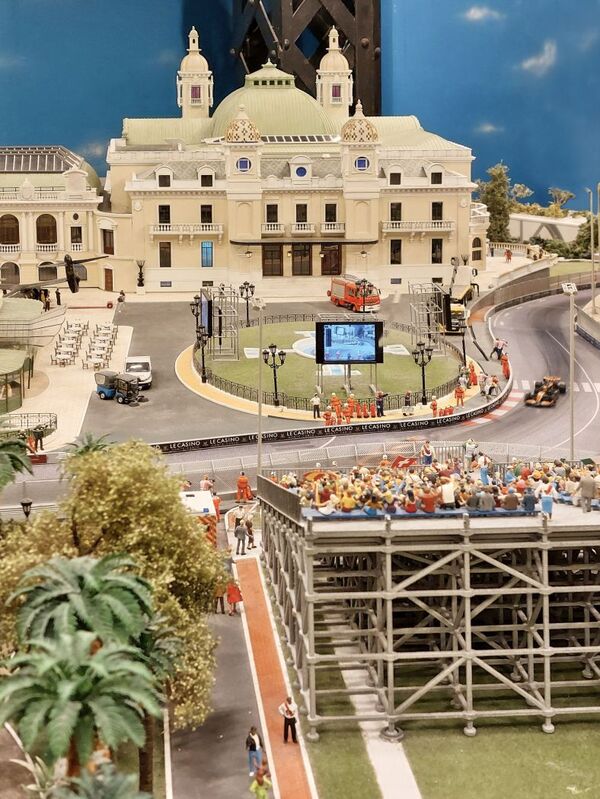 DC 25-0767-020.jpg :: Miniatur Wunderland Hamburg, Germany: The Miniatur Wunderland is, according to Guinness World Records, the largest model railway system in the world. It is located at the historic Speicherstadt in Hamburg and is one of the most popular and most visited sights in Germany. The exhibition includes around 1,230 digitally controlled trains with more than 12,000 wagons. The Wonderland is also designed with around 4,300 houses and bridges, more than 10,000 vehicles – of which around 350 drive independently on the installation – 47 airplanes and around 290,000 figures. The system features a recurring day-night lighting cycle and almost 500,000 built-in LED lights. Of the 7,000 m2 (75,347 sq ft) of floorspace, the models occupy 1,545 m2 (16,630 sq ft). P.s. Part of the Monaco section of the exhibition, Casino Square and race track. Photo taken 20/01/2025