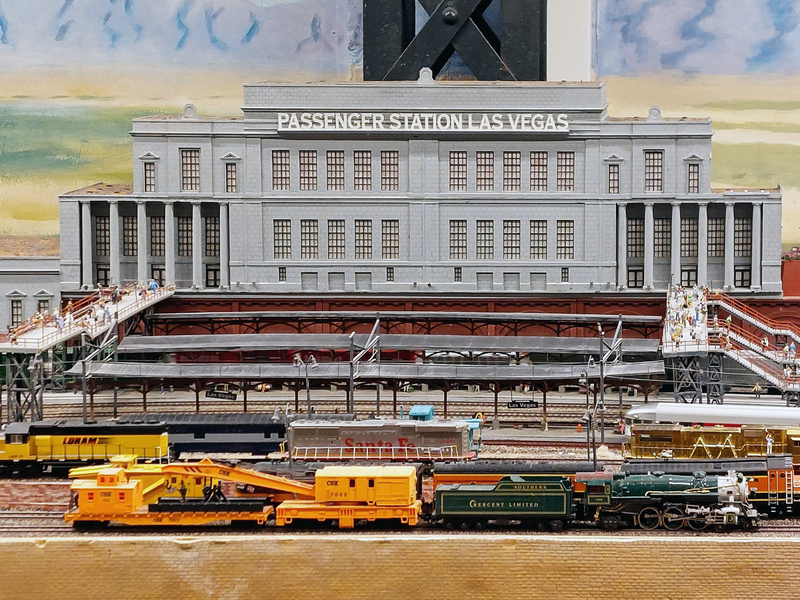 DC 25-0767-095.jpg :: Miniatur Wunderland Hamburg, Germany: The Miniatur Wunderland is, according to Guinness World Records, the largest model railway system in the world. It is located at the historic Speicherstadt in Hamburg and is one of the most popular and most visited sights in Germany. The exhibition includes around 1,230 digitally controlled trains with more than 12,000 wagons. The Wonderland is also designed with around 4,300 houses and bridges, more than 10,000 vehicles – of which around 350 drive independently on the installation – 47 airplanes and around 290,000 figures. The system features a recurring day-night lighting cycle and almost 500,000 built-in LED lights. Of the 7,000 m2 (75,347 sq ft) of floorspace, the models occupy 1,545 m2 (16,630 sq ft). P.s. Part of the USA section of the exhibition. Las Vegas Central Station. Fictional but a significant sector of the Wunderland with typical American architecture. Photo taken 20/01/2025