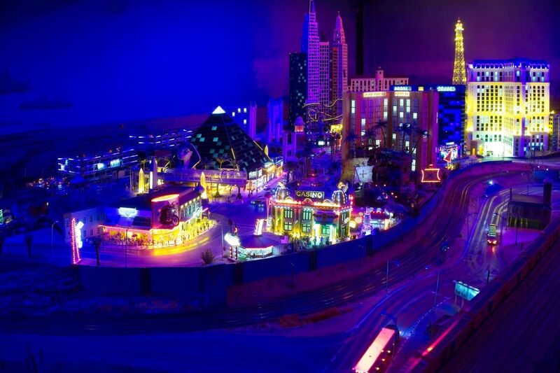DC 25-0767-121.jpg :: Miniatur Wunderland Hamburg, Germany: The Miniatur Wunderland is, according to Guinness World Records, the largest model railway system in the world. It is located at the historic Speicherstadt in Hamburg and is one of the most popular and most visited sights in Germany. The exhibition includes around 1,230 digitally controlled trains with more than 12,000 wagons. The Wonderland is also designed with around 4,300 houses and bridges, more than 10,000 vehicles – of which around 350 drive independently on the installation – 47 airplanes and around 290,000 figures. The system features a recurring day-night lighting cycle and almost 500,000 built-in LED lights. Of the 7,000 m2 (75,347 sq ft) of floorspace, the models occupy 1,545 m2 (16,630 sq ft). P.s. Part of the USA section of the exhibition. Las Vega Strip. Photo taken 20/01/2025