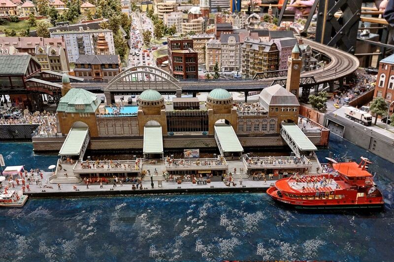 DC 25-0767-132.jpg :: Miniatur Wunderland Hamburg, Germany: The Miniatur Wunderland is, according to Guinness World Records, the largest model railway system in the world. It is located at the historic Speicherstadt in Hamburg and is one of the most popular and most visited sights in Germany. The exhibition includes around 1,230 digitally controlled trains with more than 12,000 wagons. The Wonderland is also designed with around 4,300 houses and bridges, more than 10,000 vehicles – of which around 350 drive independently on the installation – 47 airplanes and around 290,000 figures. The system features a recurring day-night lighting cycle and almost 500,000 built-in LED lights. Of the 7,000 m2 (75,347 sq ft) of floorspace, the models occupy 1,545 m2 (16,630 sq ft). P.s. Part of the Germany section of the exhibition. Hamburg. St. Pauli Piers. Photo taken 20/01/2025