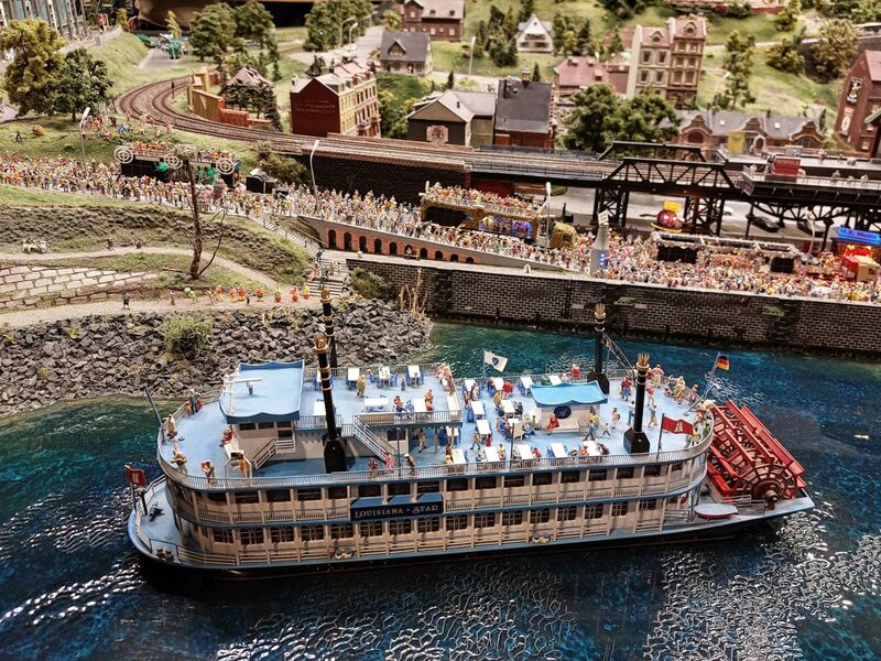 DC 25-0767-135.jpg :: Miniatur Wunderland Hamburg, Germany: The Miniatur Wunderland is, according to Guinness World Records, the largest model railway system in the world. It is located at the historic Speicherstadt in Hamburg and is one of the most popular and most visited sights in Germany. The exhibition includes around 1,230 digitally controlled trains with more than 12,000 wagons. The Wonderland is also designed with around 4,300 houses and bridges, more than 10,000 vehicles – of which around 350 drive independently on the installation – 47 airplanes and around 290,000 figures. The system features a recurring day-night lighting cycle and almost 500,000 built-in LED lights. Of the 7,000 m2 (75,347 sq ft) of floorspace, the models occupy 1,545 m2 (16,630 sq ft). P.s. Part of the Germany section of the exhibition. The Louisiana Star, old paddle steamer on the River Elbe in Hamburg. Photo taken 20/01/2025