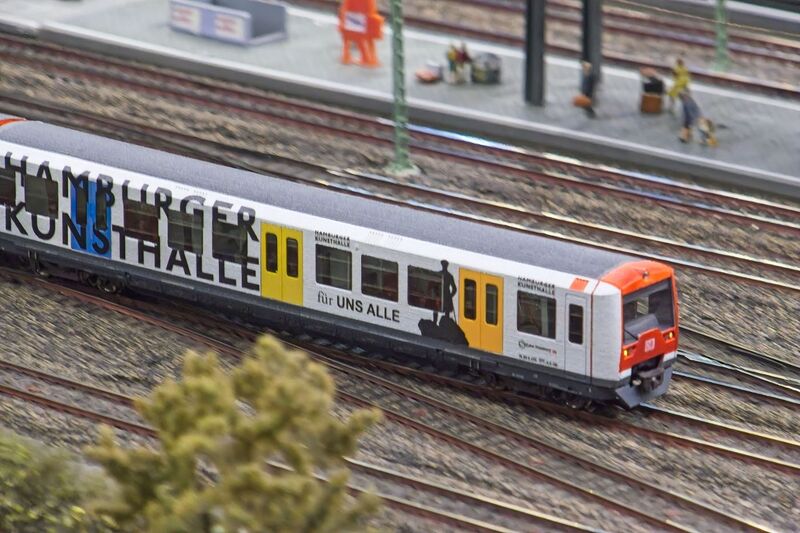 DC 25-0767-144.jpg :: Miniatur Wunderland Hamburg, Germany: The Miniatur Wunderland is, according to Guinness World Records, the largest model railway system in the world. It is located at the historic Speicherstadt in Hamburg and is one of the most popular and most visited sights in Germany. The exhibition includes around 1,230 digitally controlled trains with more than 12,000 wagons. The Wonderland is also designed with around 4,300 houses and bridges, more than 10,000 vehicles – of which around 350 drive independently on the installation – 47 airplanes and around 290,000 figures. The system features a recurring day-night lighting cycle and almost 500,000 built-in LED lights. Of the 7,000 m2 (75,347 sq ft) of floorspace, the models occupy 1,545 m2 (16,630 sq ft). P.s. Part of the Germany section of the exhibition. Altona, Hamburg. Photo taken 20/01/2025.