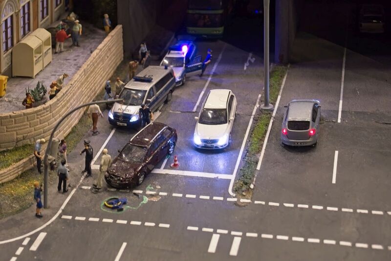 DC 25-0767-163.jpg :: Miniatur Wunderland Hamburg, Germany: The Miniatur Wunderland is, according to Guinness World Records, the largest model railway system in the world. It is located at the historic Speicherstadt in Hamburg and is one of the most popular and most visited sights in Germany. The exhibition includes around 1,230 digitally controlled trains with more than 12,000 wagons. The Wonderland is also designed with around 4,300 houses and bridges, more than 10,000 vehicles – of which around 350 drive independently on the installation – 47 airplanes and around 290,000 figures. The system features a recurring day-night lighting cycle and almost 500,000 built-in LED lights. Of the 7,000 m2 (75,347 sq ft) of floorspace, the models occupy 1,545 m2 (16,630 sq ft). P.s. Part of the Germany section of the exhibition. P.s. RTA under Hamburg Dammtor railway station. Photo taken 20/01/2025.