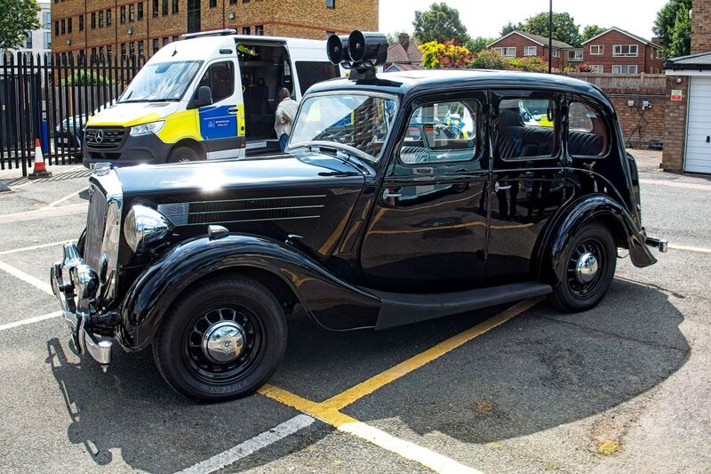 DC 25-0777-002.jpg :: Marlow House, Sidcup, Historic Police Cars Display: A Met Police preserved Wolseley 18/85 dating from 1948. Part of the Metropolitan Police Historic Vehicle Collection. Reg No. KLE 772. This is the oldest vehicle in the Met Historic Vehicle Collection. It was one of the first ever police patrol vehicles in the Met police and took part in the coronation of Queen Elizabeth II in 1953. Photo taken 08-06-2025