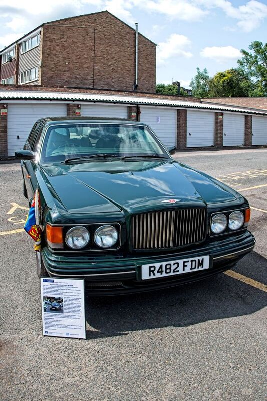 DC 25-0777-033.jpg :: Marlow House, Sidcup, Historic Police Cars Display: A Met Police 1997 Bentley Turbo TBO. Part of the Metropolitan Police Historic Vehicle Collection. This vehicle is the most recent addition to the fleet having been donated to the collection in 2012. This particular Bentley has been used by the MPS Royalty Protection unit since it was purchased. The significance of this particular vehicle is that it was used daily as Prince Charles Armoured escort car. This vehicle is heavily armoured and equipped to protect the Royal Family. The vehicle is armour plated all around top bottom and all doors It also has 4-inch-thick bullet proof glass. Reg No. R482 FDM. Photo taken 08-06-2025