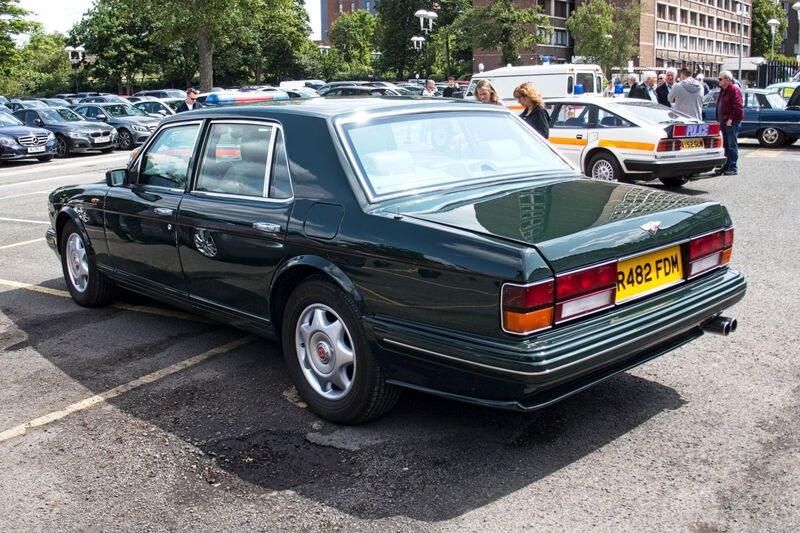 DC 25-0777-037.jpg :: Marlow House, Sidcup, Historic Police Cars Display: A Met Police 1997 Bentley Turbo TBO. Part of the Metropolitan Police Historic Vehicle Collection. This vehicle is the most recent addition to the fleet having been donated to the collection in 2012. This particular Bentley has been used by the MPS Royalty Protection unit since it was purchased. The significance of this particular vehicle is that it was used daily as Prince Charles Armoured escort car. This vehicle is heavily armoured and equipped to protect the Royal Family. The vehicle is armour plated all around top bottom and all doors It also has 4-inch-thick bullet proof glass. Reg No. R482 FDM. Photo taken 08-06-2025