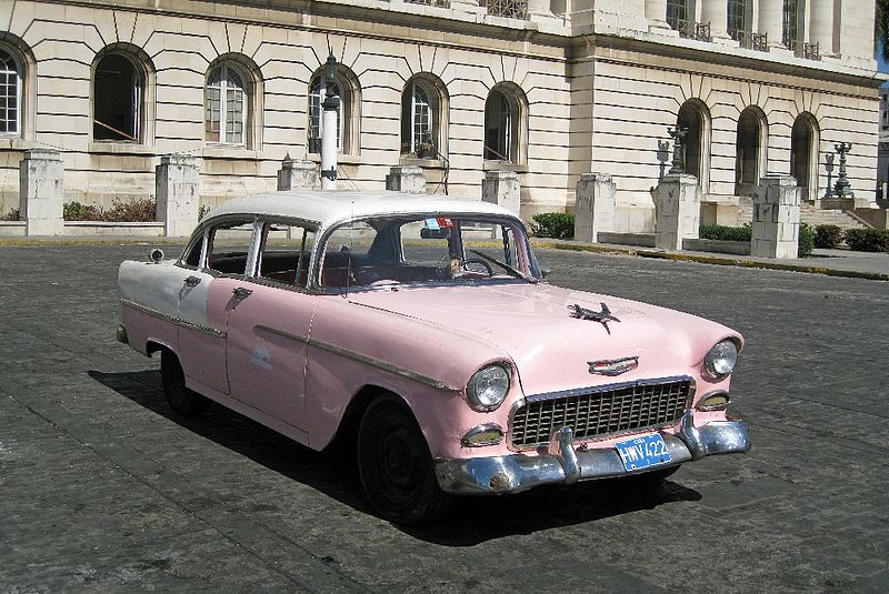 DC 11-0240-041.jpg :: 2011 - Cuban Classic Cars - 1955 Chevrolet Bel Air 4-Door Sedan outside the Capital Building in Havana. For 1955, Chevrolet's full-size model received new styling that earned it the \