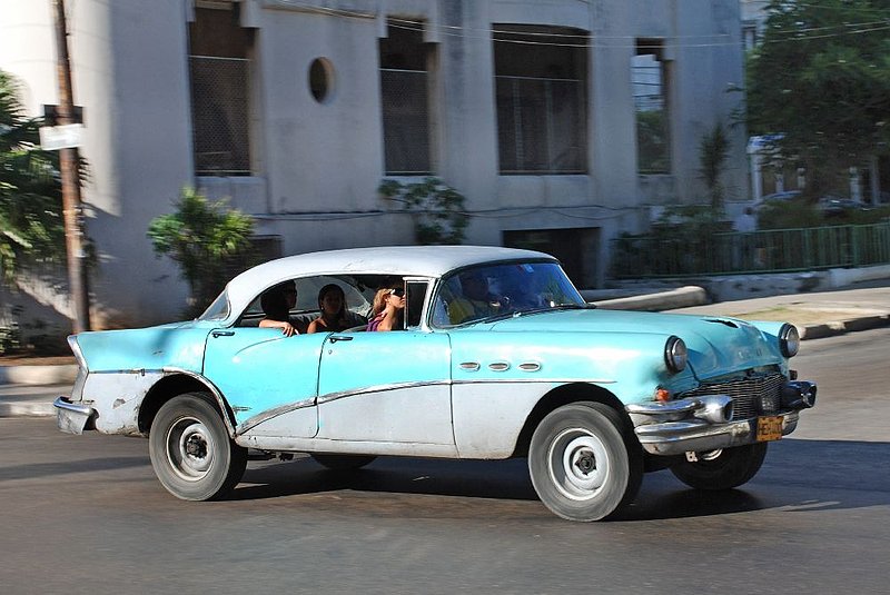 DC 11-0240-059.jpg :: 2011 - Cuban Classic Cars - 1956 Buick Riviera 4dr. Sedan. Seen outside the Hotel Tryp Habana Libre in Havana. Reg No. HEH 400 on a yellow Cuban plate. 29/05/2011  
