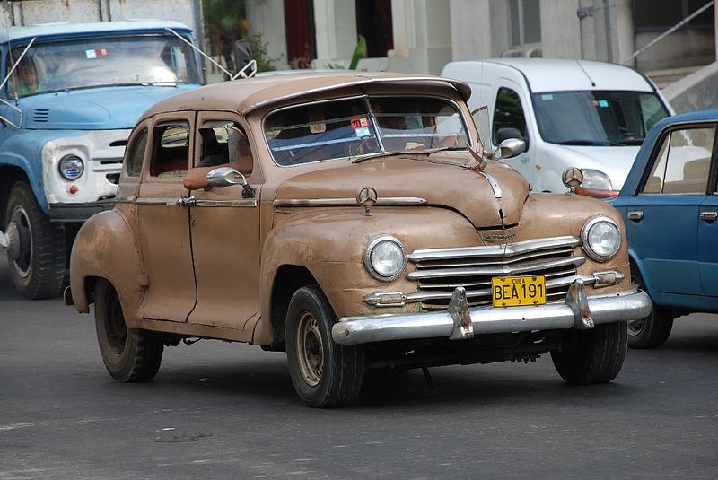 DC 11-0240-114.jpg :: 2011 - Cuban Classic Cars - 1947 Plymouth Sedan. Seen outside the Hotel Tryp Habana Libre in Havana. Reg No. BEA 191 on cuban yellow plate. 28/05/2011
