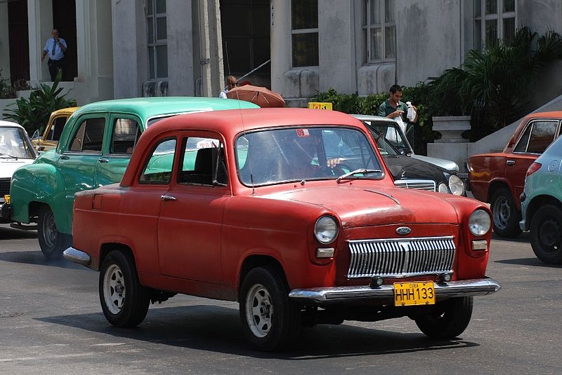 DC 11-0240-134.jpg :: 2011 - Cuban Classic Cars - Ford Popular / Anglia 100E. Seen outside the Hotel Tryp Habana Libre in Havana. Reg No. HHH 133 on cuban yellow plate. 26/05/2011
