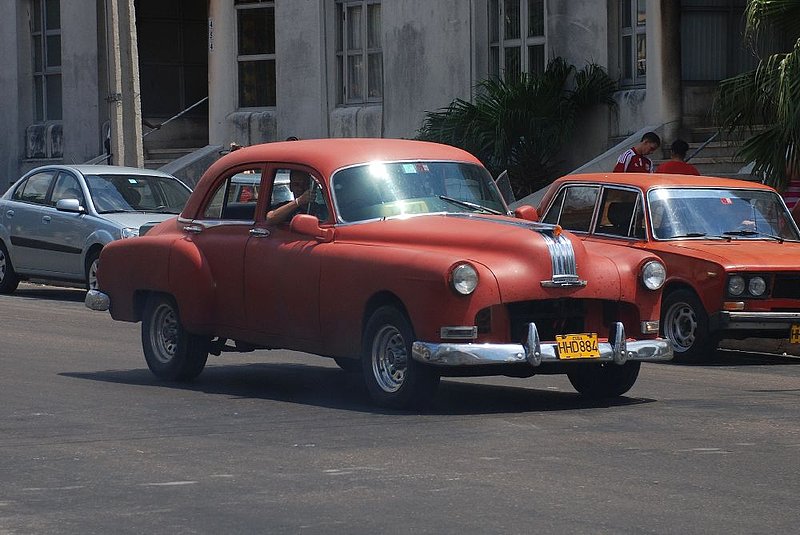 DC 11-0240-138.jpg :: 2011 - Cuban Classic Cars - 1949 Pontiac Chieftan Sedan. Seen outside the Hotel Tryp Habana Libre in Havana. Reg No. HHD 884 on a yellow Cuban plate. The Chieftain was initially introduced with four models: Sedan, Sedan Coupe, Business Coupe and Deluxe Convertible Coupe. Some of the more interesting optional items available for the first generation Chieftain included a radio with seven vacuum tubes, tissue dispenser, under seat heaters, and a Remington Auto-Home shaver.  26/05/2011  
