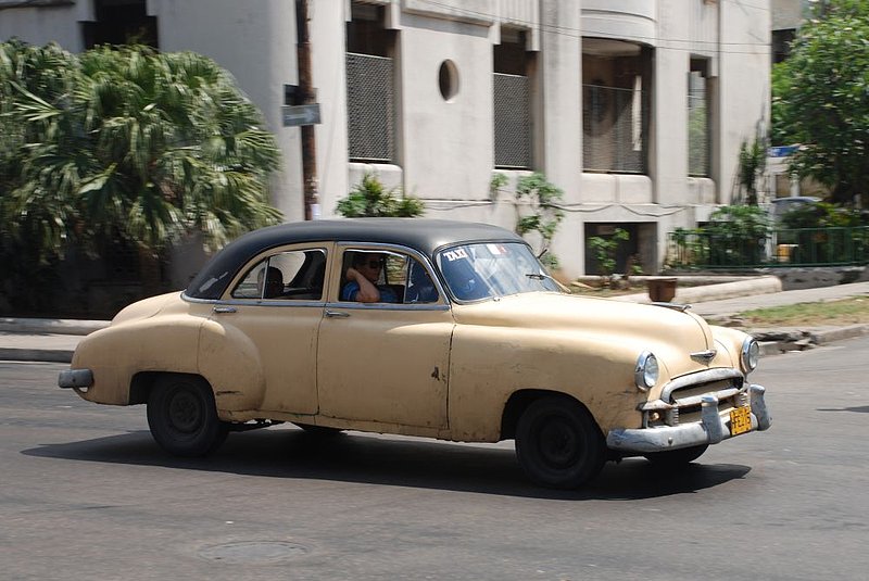 DC 11-0240-143.jpg :: 2011 - Cuban Classic Cars - 1950 Chevrolet 210 3 De Luxe 4-Door Sedan. Seen outside the Hotel Tryp Habana Libre in Havana. Reg No. HFE 215 on a yellow Cuban plate.  26/05/2011  
