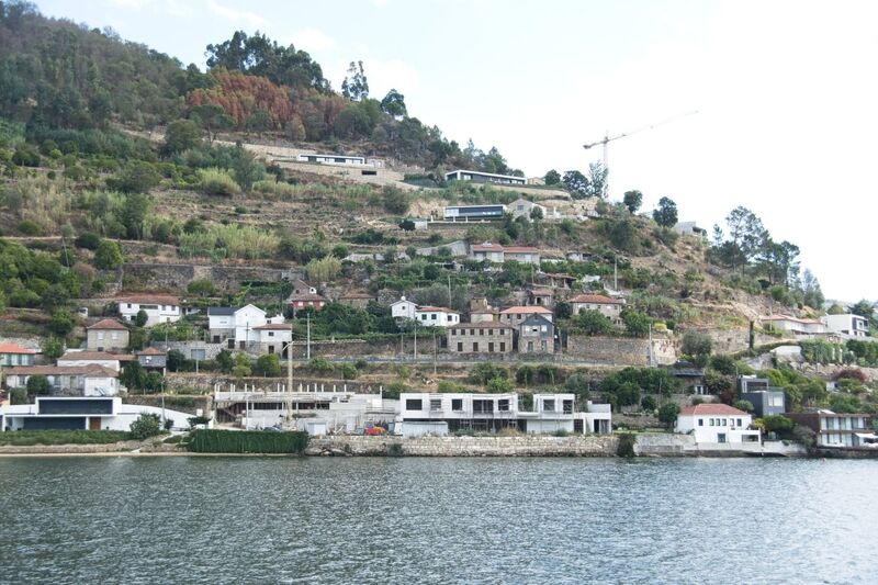 DC 22-0654-118.jpg :: Saga Douro River Cruise, Porto to Regua Lamego, River Douro: Early morning aboard the MS Douro Spirit departing Porto to Lamego. Embankment scenery on route to Lamego, passing Ribadouro. Photo taken 30/08/2022